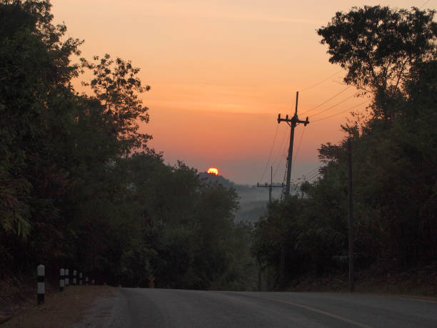 istock Autumn sunrise road 926943808