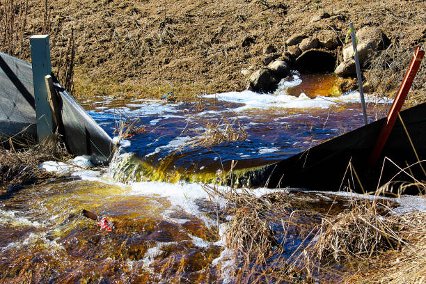 Water flowing out of a culvert in spring.