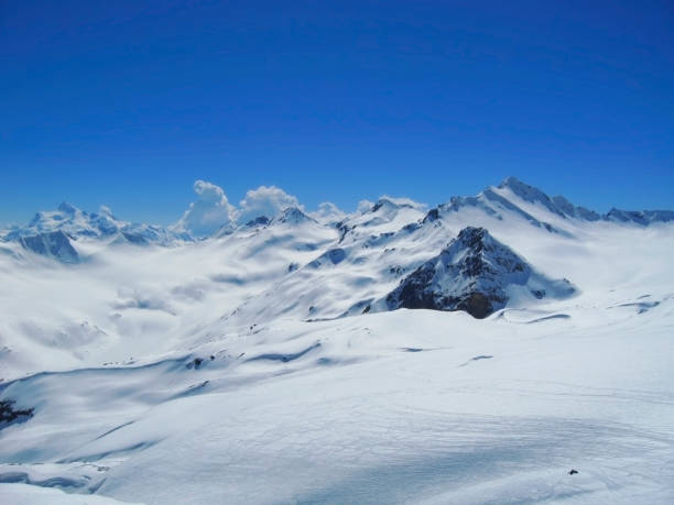 istock Caucasus mountains under the snow and clear sky 926952706