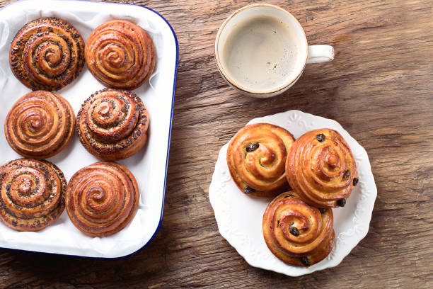 istock Sweet Cinnamon, Raisin and Poppy seeds Buns 926953204