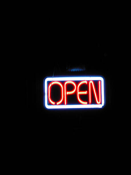 istock open sign in neon, driving by 001 92695878
