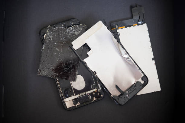 istock Broken smartphone on black box preparing for recycling and disposal 926964696