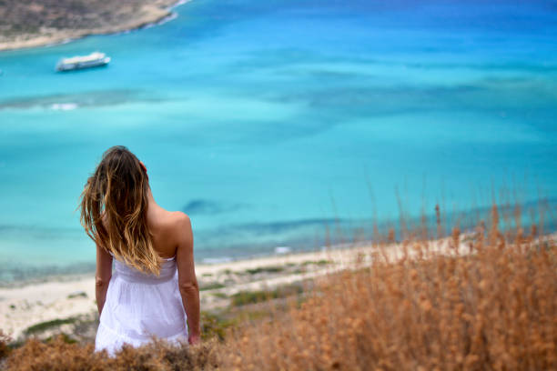 Holidays on the turquoise lagoon, in Balos Discovering Greece and typical summer dishes piraeus photos stock pictures, royalty-free photos & images