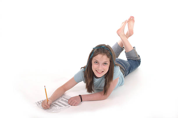 istock Young Girl Drawing and Writing 3 92696549