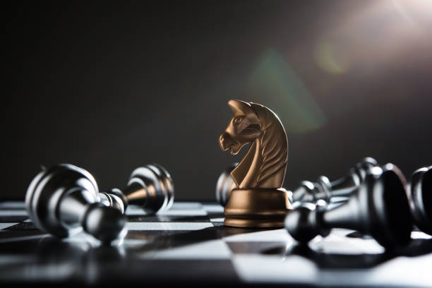 istock Chess battle defeat pawn of silver team.
