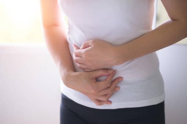 女性が腹痛、腹痛 - women stomachache abdomen stomach ストックフォトと画像