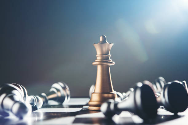 istock King and Knight of chess setup on dark background . 926968210