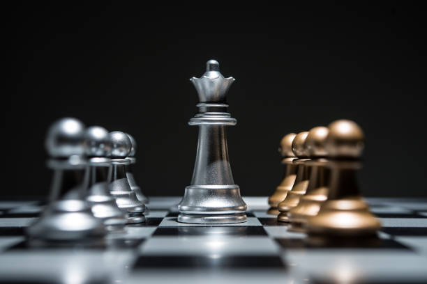 istock Chess photographed on chessboard while the game begin. 926975316