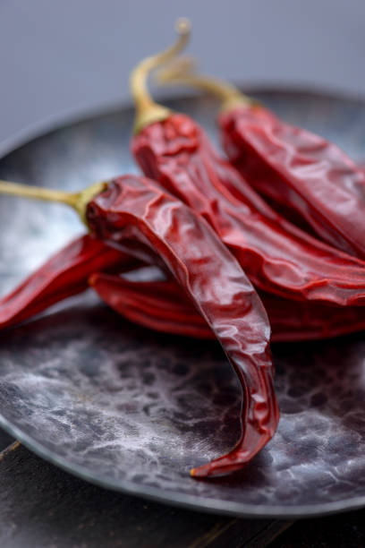 istock Close-up red chilli pepper in metal plate 926975932