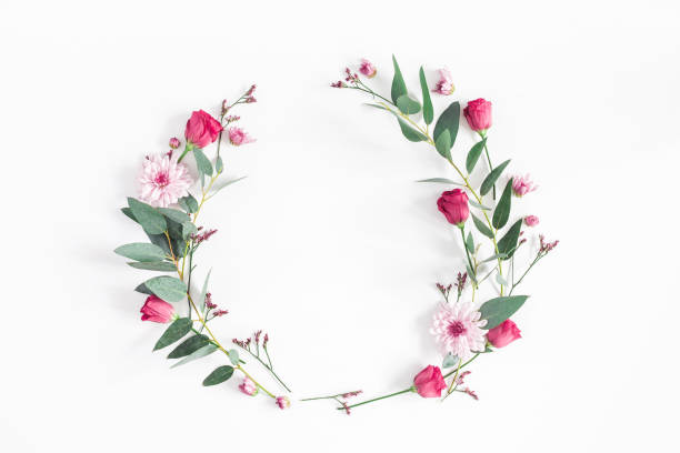 istock Pink flowers and eucalyptus branches wreath. Flat lay, top view 926978462