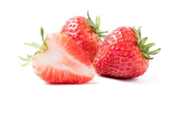 istock fresh sliced Red berry strawberries isolated 926978980