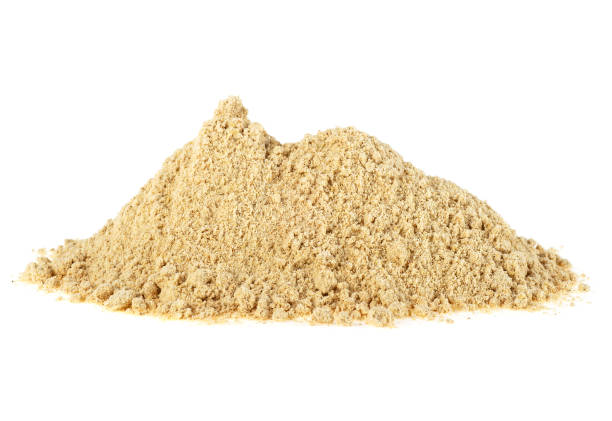 istock Pile of ginger powder on white background 926993976
