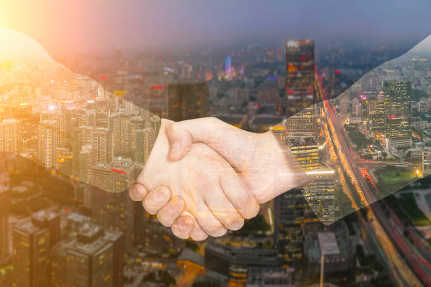 istock Deal or agreement business concept, handshake double exposure 927000812