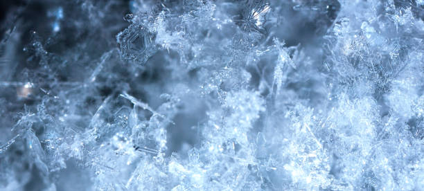 istock photo real snowflakes during a snowfall 927005294