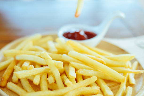 istock French fries with ketchup 927005404