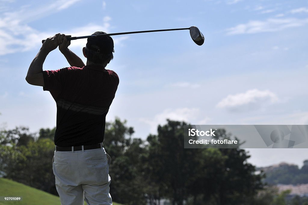 Columpio de Golf - Foto de stock de Completar la jugada libre de derechos