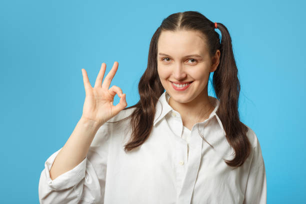 istock girl show ok sign 927011704