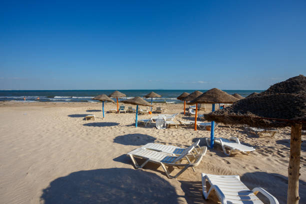 istock Beach umbrellas on sandy Tunis beach 927012416