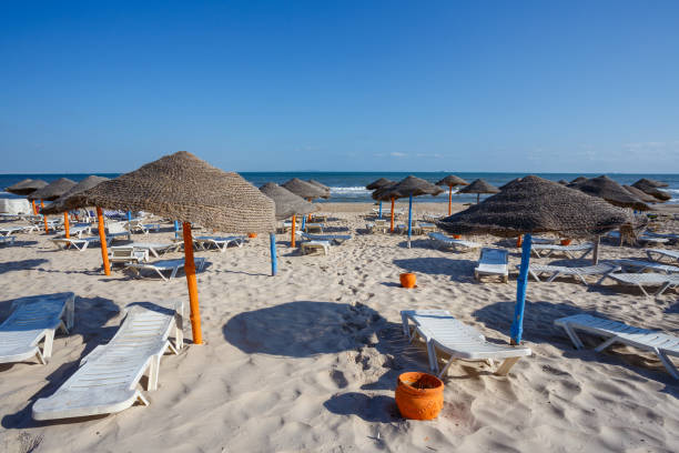 istock Beach umbrellas on sandy Tunis beach 927012422