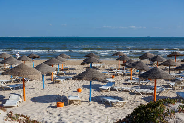 istock Beach umbrellas on sandy Tunis beach 927012426