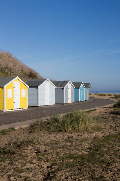 istock Beach huts at Pakefield, Suffolk, England 927028182