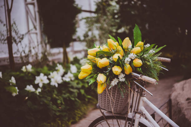 Baskets with flower at urban street.