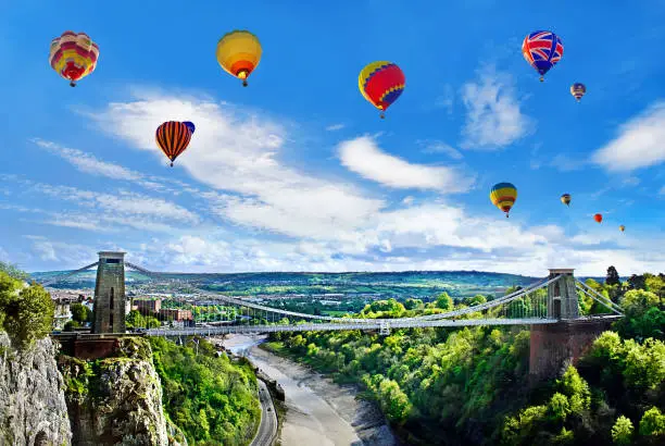 The World Famous Clifton Suspension Bridge, situated in Bristol, UK during the Annual International Balloon Festival.