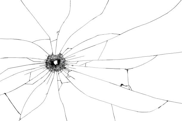 Bullet hole broken glass isolated on white background. Cut out.