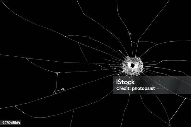 Bullet Hole Broken Glass Isolated On Black Background Cut Out Stock Photo - Download Image Now