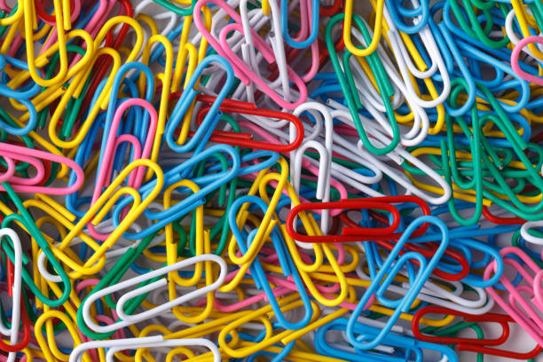 istock pile of colored office paper clips 927045836
