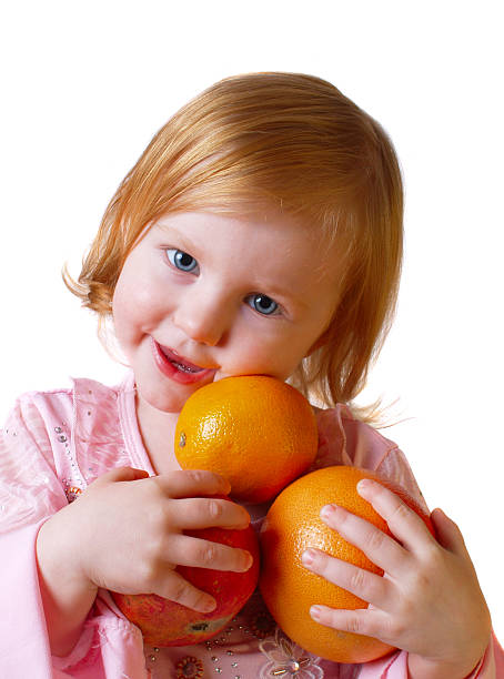 istock girl with orange 92704700