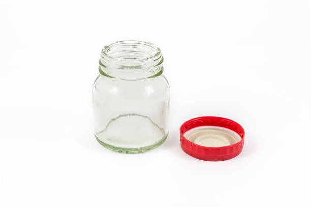 istock Glass bottle with red lid. 927056994