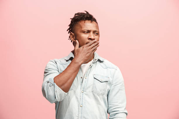 istock Young serious thoughtful Afro-American businessman. Doubt concept 927057650