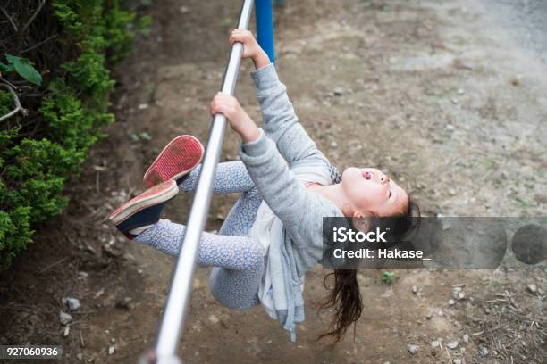 Little Girl Playing With An Iron Bar Stock Photo - Download Image Now - Active Lifestyle, Aspirations, Beautiful People