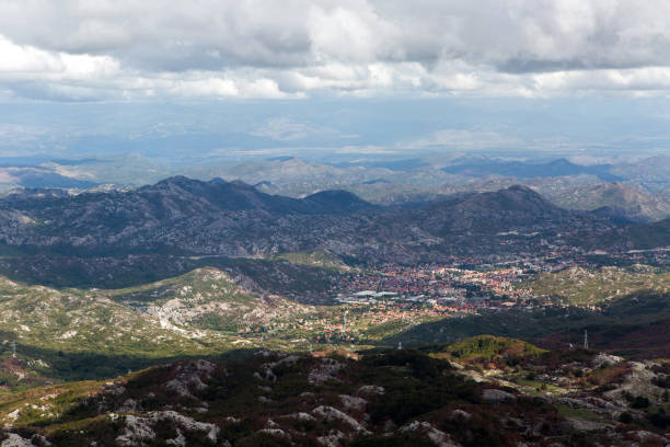 istock mountain view with thick clouds down to the lowland 927060960