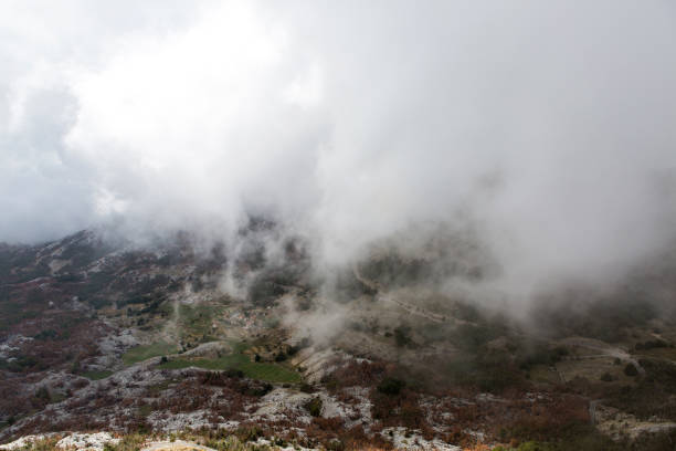 istock mountain view with thick clouds down to the lowland 927061042