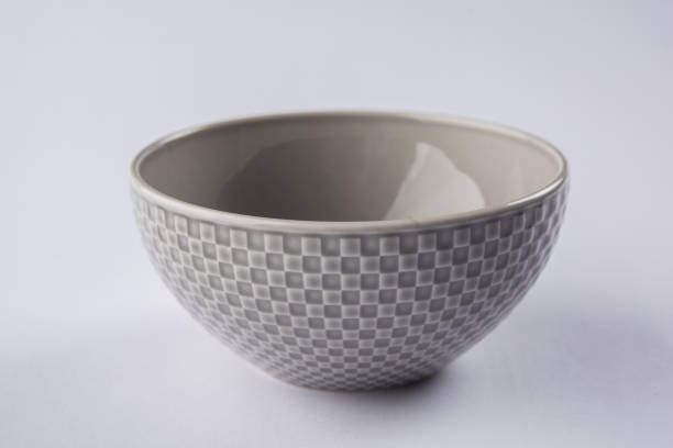 Empty gray designer ceramic serving bowl, isolated over white or gray background