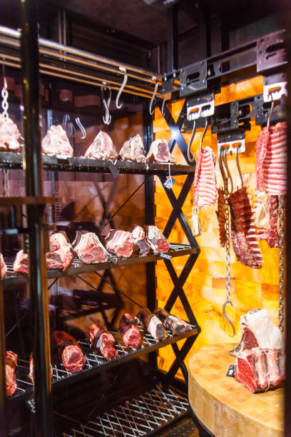 istock Beef dry aging rib eye on bone and rib in a special chamber. 927065436