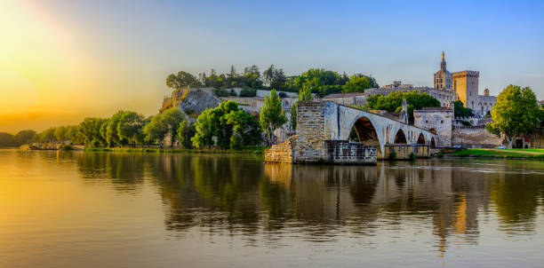 Sunrise of Avignon Bridge with Popes Palace, Pont Saint-Benezet, Provence, France stock photo