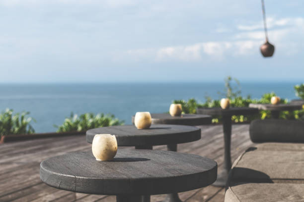 istock Tropical restaurant with sea view. Sunny day. Space for text. Bali island 927069080