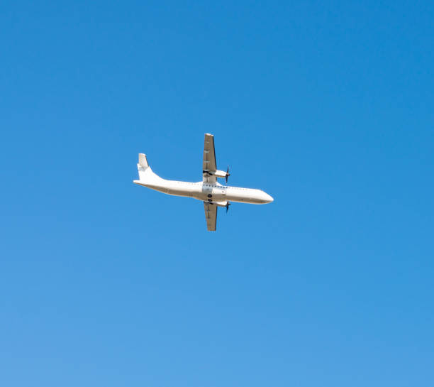 istock Passenger plane flying in the blue sky 927087186
