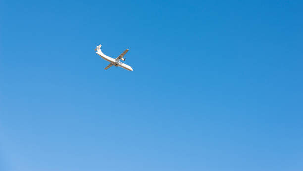 istock Passenger plane flying in the blue sky 927087196