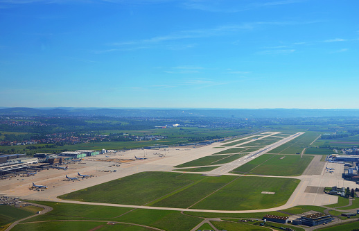 Stuttgart, Germany - June 11, 2017: Aerial view of Stuttgart area and an airport landing strip