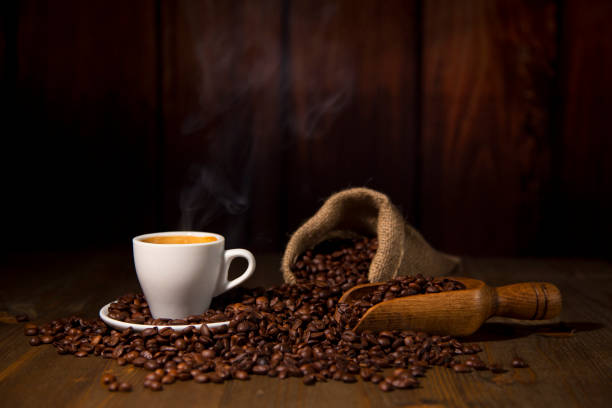 istock A Espresso Coffee Cup with smoke Beans and Jute Bag 927091970