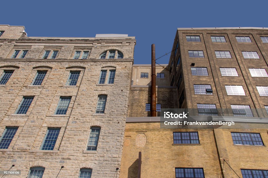 Industrial facades Facades of old and colorful industrial buildings. Warehouse Stock Photo