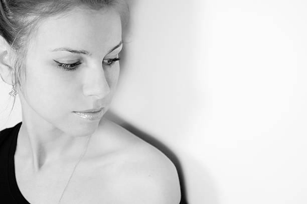 istock Thoughtful the young girl on a light background 92710909