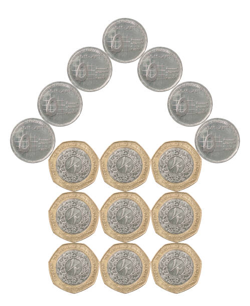 istock house built of coins 927120684