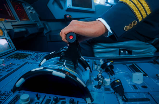 istock A Pilot hand is controlling plane to fly take off and landing 927122262