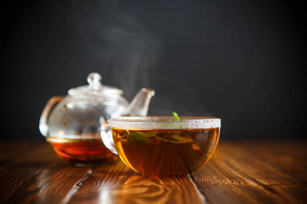 istock hot tea in a glass teapot 927128412