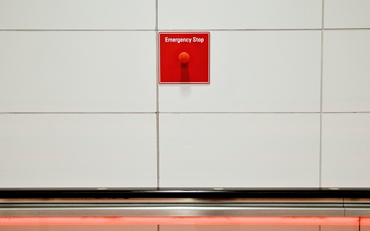 subway escalator emergency button